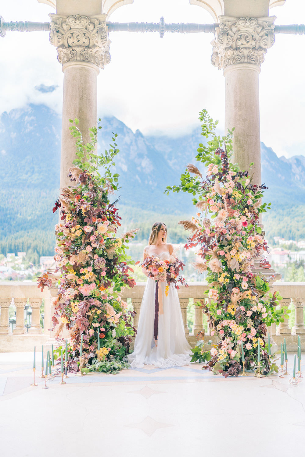 bridal portrait in front of the ceremony arch